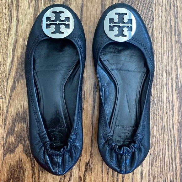 Tory Burch Shoes - Black Tory Burch Reva ballet flats with silver logo. Good used condition